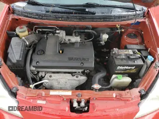 2003 Suzuki Aerio SX z VIN JS2RC41H235204287, wystawiony jako Copart lot #72974714 z przebiegiem Nie podano mil oraz Nie do naprawy. Historia ofert i sprzedaży dostępna na DreamBid. Obrazek 11.