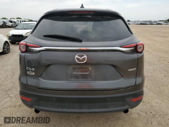 2021 Mazda CX-9 Touring z VIN JM3TCACY1M0502783, wystawiony jako Copart lot #53551935 z przebiegiem 71 373 mil mil oraz Czysty tytuł • Clean title. Historia ofert i sprzedaży dostępna na DreamBid. Obrazek 6.