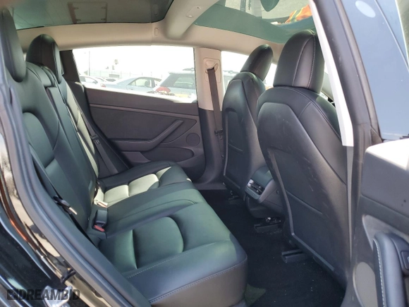 2021 Tesla Model 3 Standard Range Plus with VIN 5YJ3E1EAXMF069467, listed as a Copart auction lot 63273134 with 66,393 mi miles and Salvage Title. Bid and sale history available at carsss.com. Image 10.