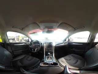 2016 Ford Fusion Titanium with VIN 3FA6P0K90GR179528, listed as a IAAI auction lot 42181213 with 230,264 mi miles. Bid and sale history available at carsss.com. Image 21.