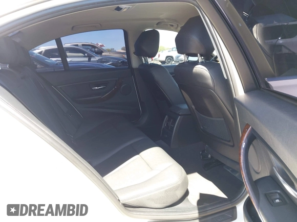 2015 BMW 3 Series 328i with VIN WBA3C1C52FK117753, listed as a IAAI auction lot 42270013 with 147,386 mi miles and . Bid and sale history available at DreamBid. Image 8.