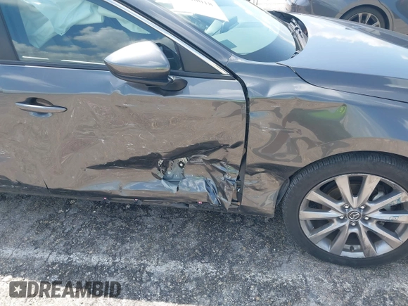 2023 Mazda 3 S Preferred with VIN 3MZBPACM8PM361196, listed as a IAAI auction lot 41940018 with 49,759 mi miles and . Bid and sale history available at DreamBid. Image 19.