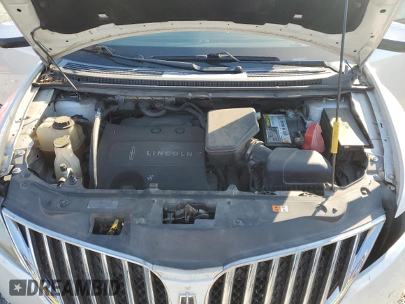 2011 Lincoln MKX z VIN 2LMDJ6JK0BBJ34056, wystawiony jako Copart lot #77958124 z przebiegiem 213 173 mil mil oraz Szkoda całkowita • Salvage title. Historia ofert i sprzedaży dostępna na DreamBid. Obrazek 12.