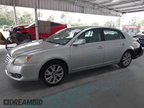 2009 Toyota Avalon XL with VIN 4T1BK36B69U341854, listed as a IAAI auction lot 41727553 with 102,369 mi miles. Bid and sale history available at carsss.com. Image 14.