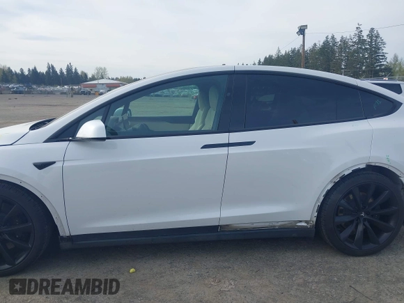 2022 Tesla Model X with VIN 7SAXCBE54NF363113, listed as a IAAI auction lot 41978397 with 27,166 mi miles. Bid and sale history available at carsss.com. Image 15.