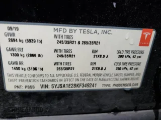 2019 Tesla Model S 75D with VIN 5YJSA1E28KF349241, listed as a Copart auction lot 55279595 with 77,005 mi miles and Salvage title. Bid and sale history available at DreamBid. Image 12.