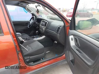 2006 Mazda Tribute i with VIN 4F2YZ02Z96KM08546, listed as a IAAI auction lot 41554299 with Not Provided miles and . Bid and sale history available at carsss.com. Image 5.
