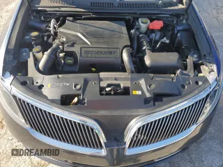 2014 Lincoln MKS EcoBoost z VIN 1LNHL9FT8EG607807, wystawiony jako Copart lot #57755915 z przebiegiem 203 316 mil mil oraz Szkoda całkowita • Salvage title. Historia ofert i sprzedaży dostępna na DreamBid. Obrazek 11.