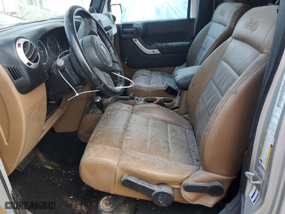2011 Jeep Wrangler Unlimited Sahara with VIN 1J4BA5H14BL613895, listed as a Copart auction lot 65171404 with 0 mi miles and Non Repairable. Bid and sale history available at carsss.com. Image 7.