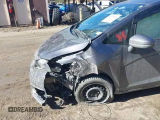 2018 Honda Fit LX z VIN 3HGGK5G44JM716592, wystawiony jako IAAI lot #41878820 z przebiegiem 70 464 mil mil oraz . Historia ofert i sprzedaży dostępna na DreamBid. Obrazek 6.