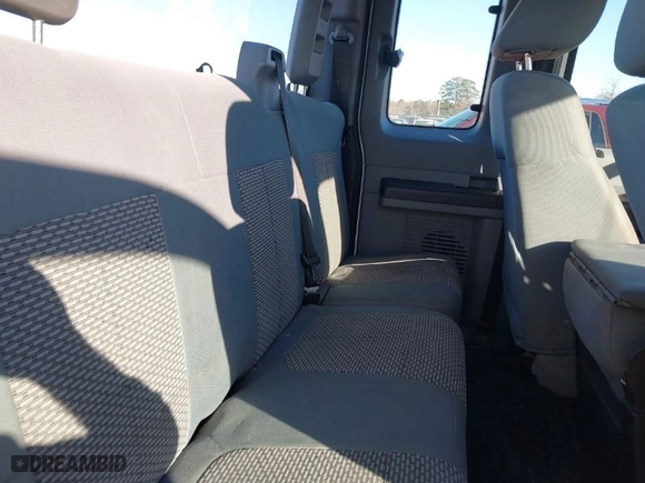 2015 Ford Super Duty F-250 SRW XLT with VIN 1FT7X2B69FEB71297, listed as a IAAI auction lot 41665201 with 214,931 mi miles. Bid and sale history available at carsss.com. Image 8.