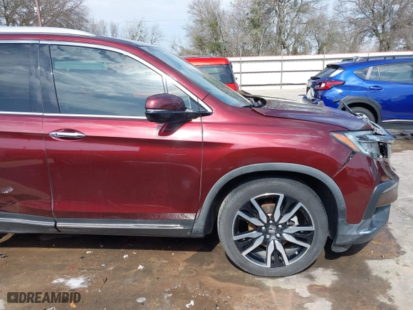 2019 Honda Pilot Touring 8-Passenger with VIN 5FNYF5H95KB009122, listed as a IAAI auction lot 41573338 with 85,845 mi miles. Bid and sale history available at carsss.com. Image 19.