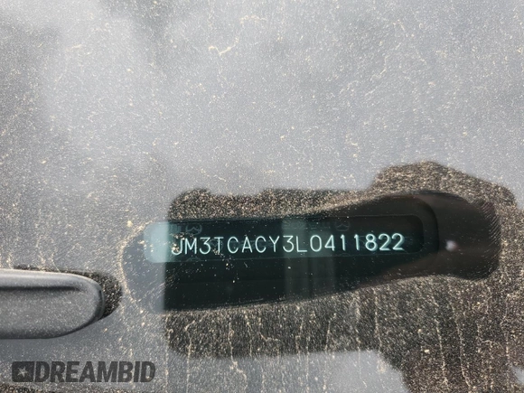 2020 Mazda CX-9 Touring z VIN JM3TCACY3L0411822, wystawiony jako Copart lot #60323295 z przebiegiem 61 348 mil mil oraz Szkoda całkowita • Salvage title. Historia ofert i sprzedaży dostępna na DreamBid. Obrazek 14.
