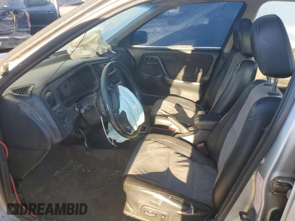 2002 Infiniti G20 Luxury with VIN JNKCP11A02T512055, listed as a Copart auction lot 42599045 with 160,649 mi miles and Salvage Title. Bid and sale history available at DreamBid. Image 7.