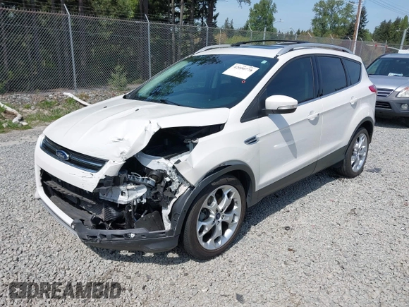 2016 Ford Escape Titanium with VIN 1FMCU9J93GUA40252, listed as a IAAI auction lot 42000778 with 37,914 mi miles. Bid and sale history available at carsss.com. Image 2.