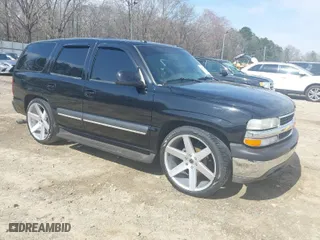 2003 Chevrolet Tahoe LT with VIN 1GNEC13Z73J322783, listed as a IAAI auction lot 41773868 with 259,710 mi miles. Bid and sale history available at carsss.com. Image 1.