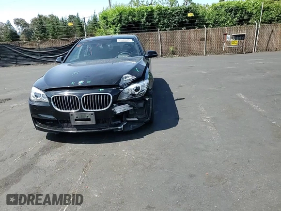 2013 BMW 7 Series 740i with VIN WBAYA6C58DC994974, listed as a Copart auction lot 55534645 with 106,975 mi miles and Salvage title. Bid and sale history available at DreamBid. Image 13.