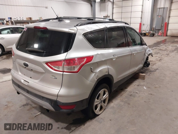 2013 Ford Escape SE with VIN 1FMCU9GX7DUB89197, listed as a IAAI auction lot 42311546 with 131,263 mi miles and . Bid and sale history available at DreamBid. Image 4.