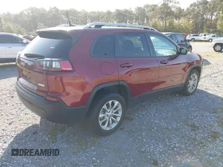 2021 Jeep Cherokee Latitude with VIN 1C4PJLCBXMD121269, listed as a IAAI auction lot 41717615 with 51,211 mi miles. Bid and sale history available at carsss.com. Image 4.