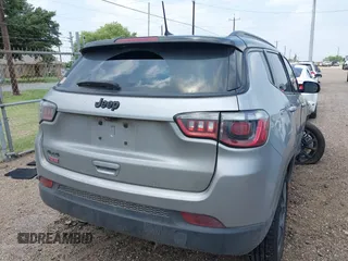 2023 Jeep Compass Latitude with VIN 3C4NJDBN5PT509999, listed as a IAAI auction lot 42206354 with 62,165 mi miles and . Bid and sale history available at DreamBid. Image 4.