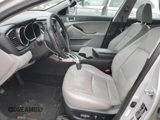 2013 Kia Optima EX z VIN 5XXGN4A7XDG144632, wystawiony jako Copart lot #83599614 z przebiegiem 97 316 mil mil oraz Szkoda całkowita • Salvage title. Historia ofert i sprzedaży dostępna na DreamBid. Obrazek 7.