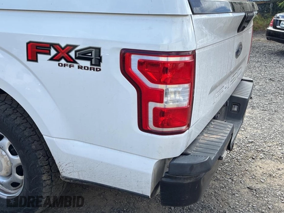 2018 Ford F-150 XL with VIN 1FTFW1E53JKC39874, listed as a Copart auction lot 66670325 with 112,915 mi miles and Clean title. Bid and sale history available at DreamBid. Image 11.