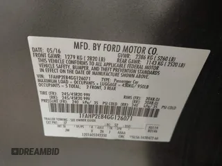 2016 Ford Taurus SEL with VIN 1FAHP2E84GG126071, listed as a IAAI auction lot 42107321 with 99,211 mi miles and . Bid and sale history available at DreamBid. Image 9.