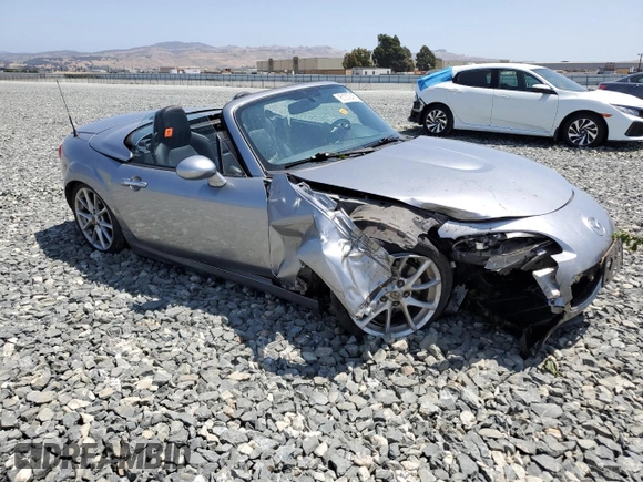2010 Mazda MX-5 Miata Grand Touring with VIN JM1NC2FF5A0205190, listed as a Copart auction lot 61372455 with 147,852 mi miles and Salvage title. Bid and sale history available at DreamBid. Image 4.