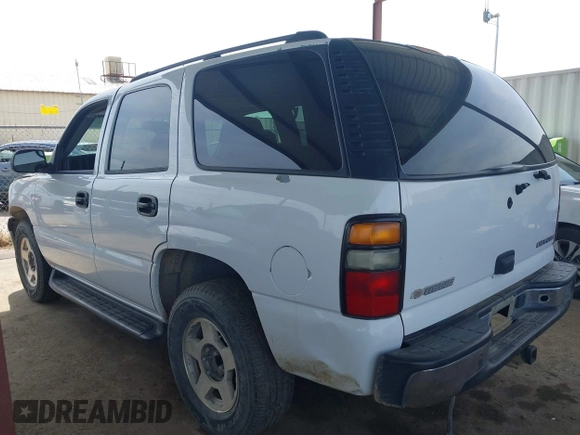 2004 Chevrolet Tahoe LS with VIN 1GNEC13V24J290596, listed as a IAAI auction lot 41956638 with 199,004 mi miles. Bid and sale history available at carsss.com. Image 3.