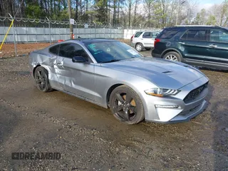 2023 Ford Mustang EcoBoost with VIN 1FA6P8TH9P5101952, listed as a IAAI auction lot 41248596 with 19,170 mi miles. Bid and sale history available at carsss.com. Image 1.