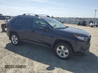 2020 Toyota RAV4 XLE with VIN 2T3W1RFV2LW074325, listed as a Copart auction lot 58693665 with 34,830 mi miles and Salvage title. Bid and sale history available at DreamBid. Image 4.