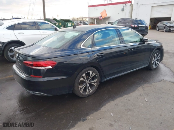 2021 Volkswagen Passat 2.0T SE with VIN 1VWSA7A32MC012952, listed as a IAAI auction lot 41370840 with 71,141 mi miles. Bid and sale history available at carsss.com. Image 4.
