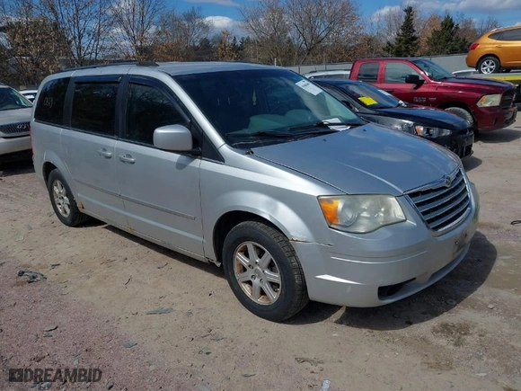 2010 Chrysler Town & Country Touring with VIN 2A4RR5D11AR308213, listed as a IAAI auction lot 41860649 with 196,072 mi miles. Bid and sale history available at carsss.com. Image 1.