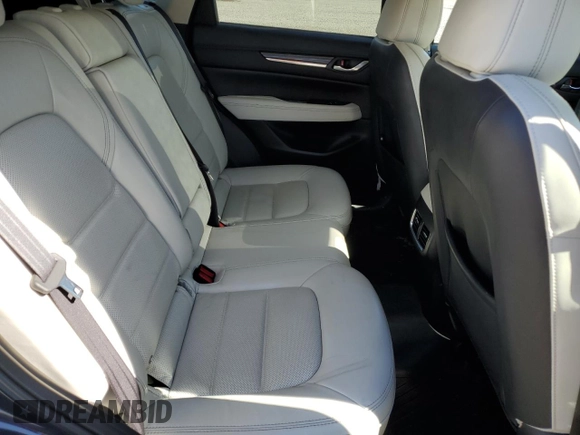 2018 Mazda CX-5 Grand Touring z VIN JM3KFBDM5J0379246, wystawiony jako Copart lot #58587865 z przebiegiem 46 339 mil mil oraz Szkody całkowita. Historia ofert i sprzedaży dostępna na DreamBid. Obrazek 11.