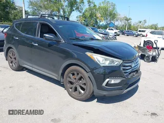 2017 Hyundai Santa Fe Ultimate z VIN 5XYZW4LA1HG460971, wystawiony jako IAAI lot #42139515 z przebiegiem 86 379 mil mil oraz . Historia ofert i sprzedaży dostępna na DreamBid. Obrazek 1.