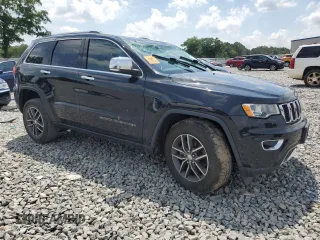 2017 Jeep Grand Cherokee Limited with VIN 1C4RJEBG9HC837822, listed as a Copart auction lot 57498835 with 140,179 mi miles and Salvage title. Bid and sale history available at DreamBid. Image 4.