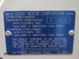 2006 Suzuki Grand Vitara Premium z VIN JS3TD943164101223, wystawiony jako Copart lot #43979705 z przebiegiem 147 813 mil mil oraz Czysty tytuł • Clean title. Historia ofert i sprzedaży dostępna na DreamBid. Obrazek 13.