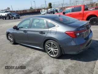 2024 Honda Civic Sedan Touring with VIN 2HGFE1F91RH303600, listed as a Copart auction lot 50323155 with 18,396 mi miles and Salvage Title. Bid and sale history available at carsss.com. Image 2.