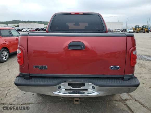 2001 Ford F-150 SuperCrew XLT with VIN 1FTRW08L81KA41003, listed as a Copart auction lot 72388534 with 319,211 mi miles and Salvage Title. Bid and sale history available at carsss.com. Image 6.