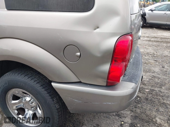 2004 Dodge Durango Limited z VIN 1D8HB58D54F166696, wystawiony jako IAAI lot #42202962 z przebiegiem Nie podano mil oraz . Historia ofert i sprzedaży dostępna na DreamBid. Obrazek 13.