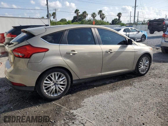 2016 Ford Focus Titanium with VIN 1FADP3N24GL302625, listed as a Copart auction lot 59180675 with 97,401 mi miles and Salvage title. Bid and sale history available at DreamBid. Image 3.