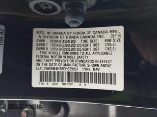 2014 Honda CR-V EX-L with VIN 2HKRM4H76EH659957, listed as a IAAI auction lot 41310681 with 256,784 mi miles. Bid and sale history available at carsss.com. Image 9.