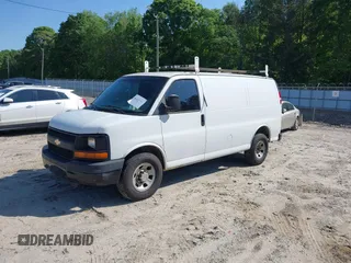 2009 Chevrolet Express Cargo Van with VIN 1GCGG25C791125061, listed as a IAAI auction lot 42131397 with 247,397 mi miles. Bid and sale history available at carsss.com. Image 2.
