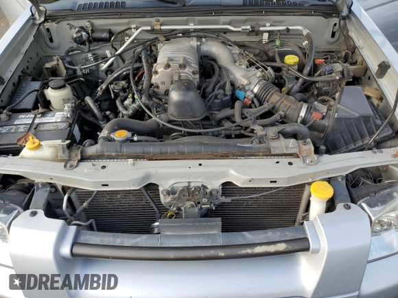 2002 Nissan Frontier SC z VIN 1N6MD29Y12C326737, wystawiony jako Copart lot #63475954 z przebiegiem 199 337 mil mil oraz Czysty tytuł • Clean title. Historia ofert i sprzedaży dostępna na DreamBid. Obrazek 11.