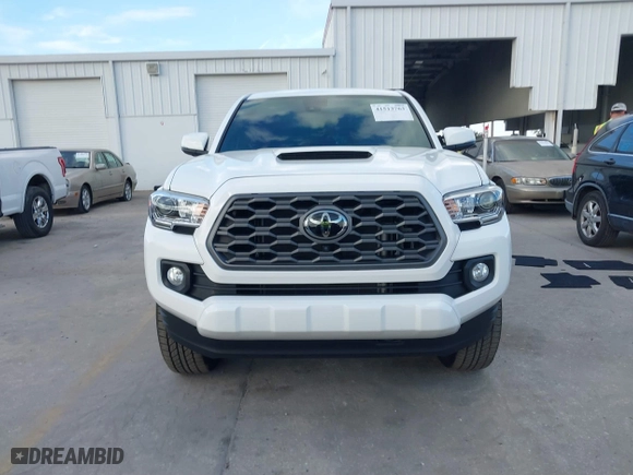 2023 Toyota Tacoma 4WD SR with VIN 3TMCZ5AN9PM566739, listed as a IAAI auction lot 41513763 with 16,708 mi miles. Bid and sale history available at carsss.com. Image 13.