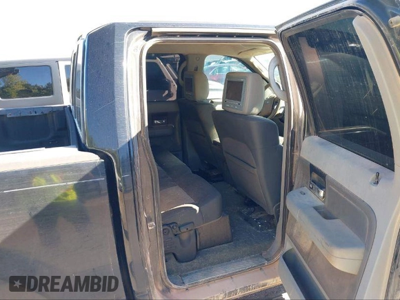 2007 Ford F-150 XLT z VIN 1FTRW12W77KA79128, wystawiony jako IAAI lot #41099284 z przebiegiem 154 191 mil mil oraz . Historia ofert i sprzedaży dostępna na DreamBid. Obrazek 8.