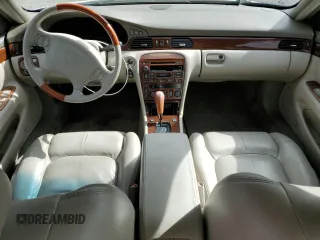 2000 Cadillac Seville Touring STS z VIN 1G6KY5497YU191639, wystawiony jako Copart lot #49658115 z przebiegiem 82 725 mil mil oraz Szkoda całkowita • Salvage title. Historia ofert i sprzedaży dostępna na DreamBid. Obrazek 8.