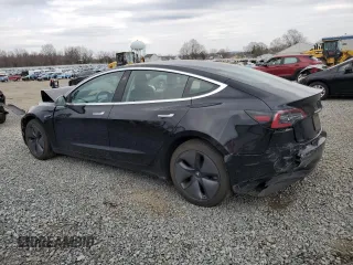 2019 Tesla Model 3 Long Range with VIN 5YJ3E1EB2KF197062, listed as a Copart auction lot 50874925 with 50,989 mi miles and Salvage Title. Bid and sale history available at carsss.com. Image 2.
