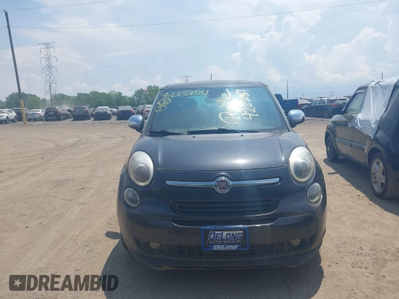 2014 FIAT 500L Lounge with VIN ZFBCFACH1EZ003031, listed as a IAAI auction lot 42232861 with 104,496 mi miles and . Bid and sale history available at DreamBid. Image 6.