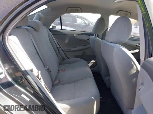 2009 Toyota Corolla with VIN 1NXBU40E99Z108425, listed as a IAAI auction lot 39553892 with 208,165 mi miles and . Bid and sale history available at DreamBid. Image 8.